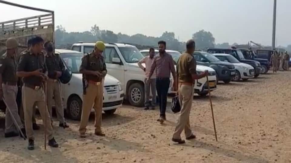 Land Acquisition Women lie down in front of JCB in Etah railway officials left sweating