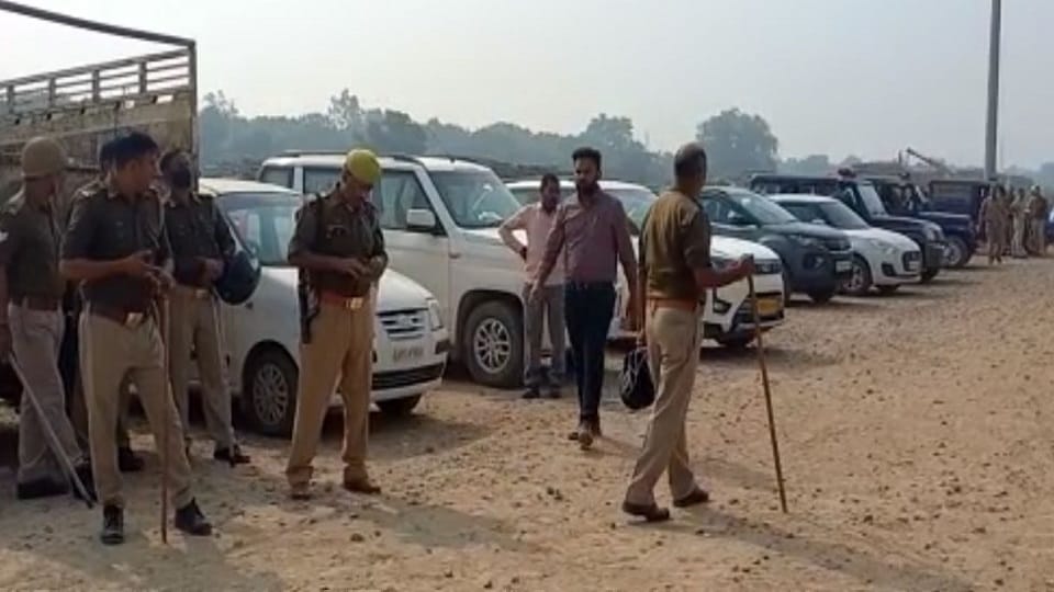 Land Acquisition Women lie down in front of JCB in Etah railway officials left sweating