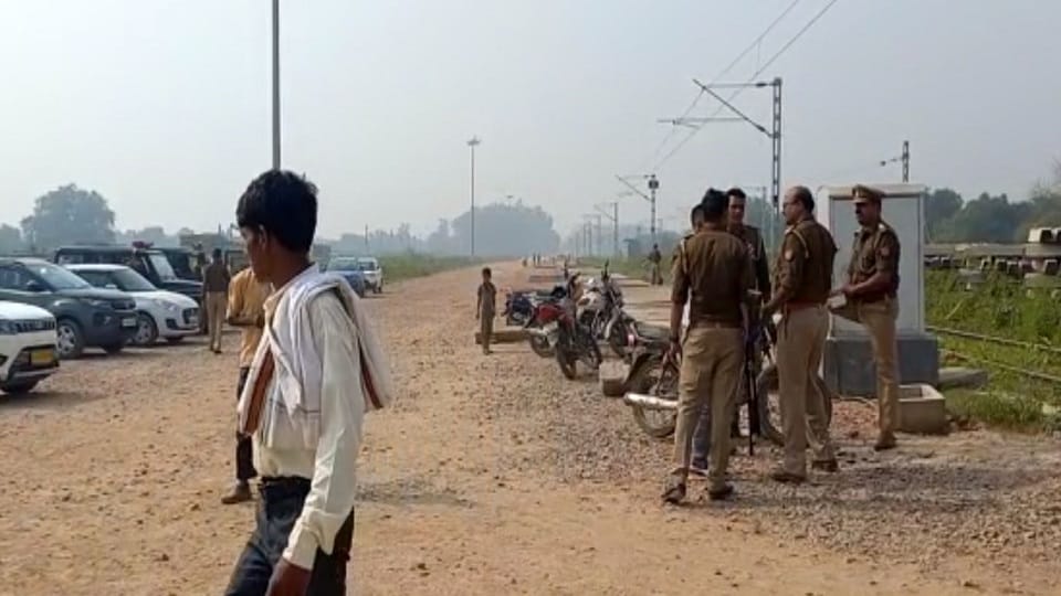 Land Acquisition Women lie down in front of JCB in Etah railway officials left sweating