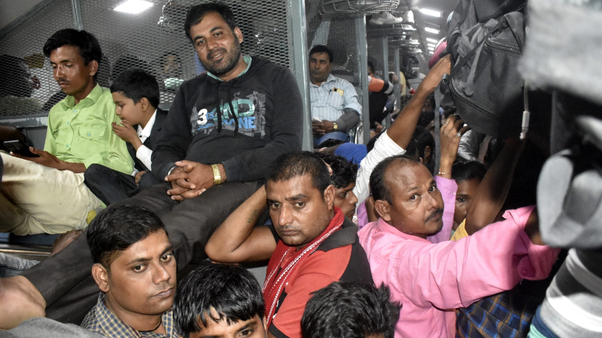 Compulsion to travel while sitting on luggage stand when seat is full