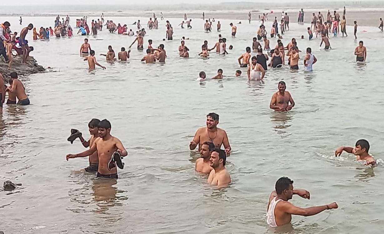 Devotees take a dip of faith in the Ganges
