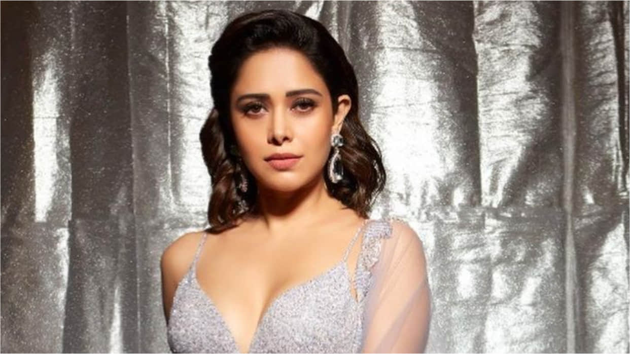 nushrat bharucha looks oh so gorgeous in fuchsia pink saree with bold design neckline blouse