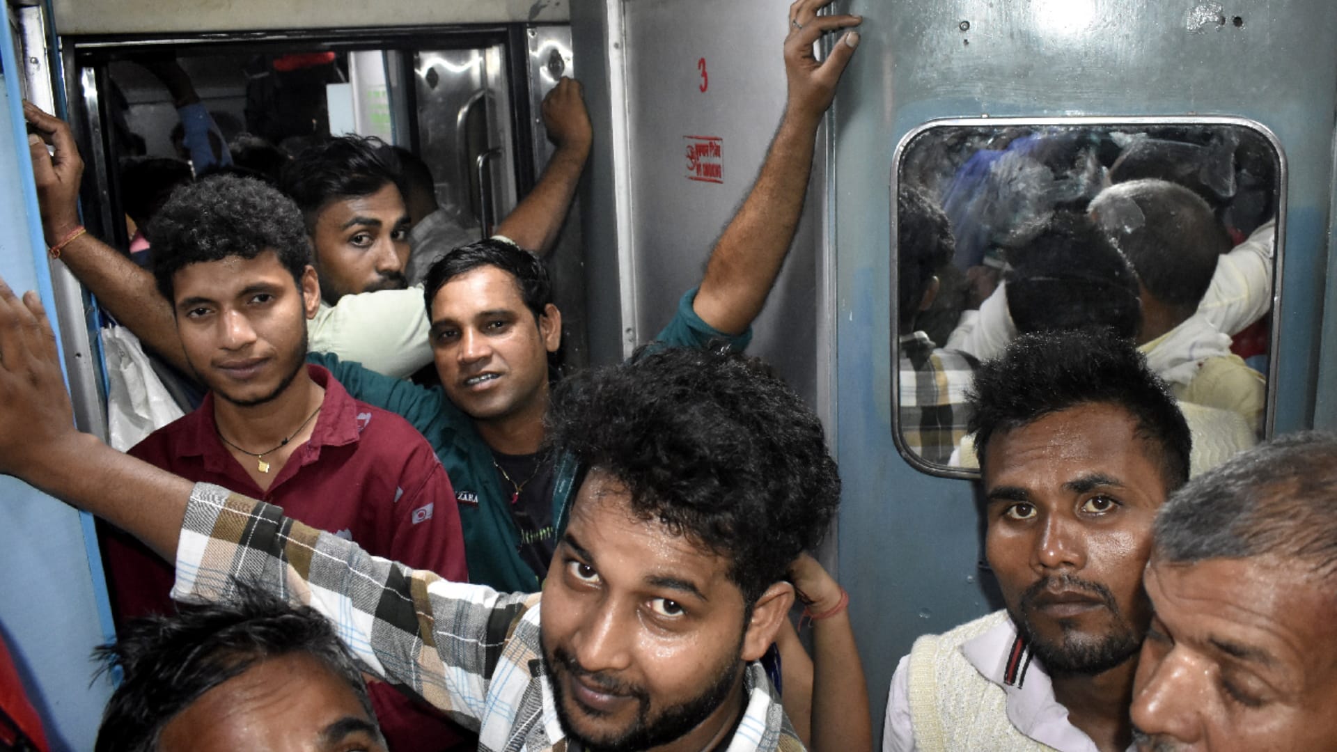 Compulsion to travel while sitting on luggage stand when seat is full
