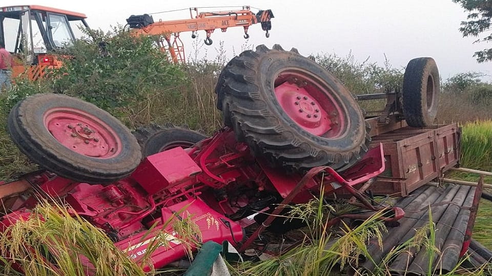 One killed three others injured when a tractor laden with a pipe overturns