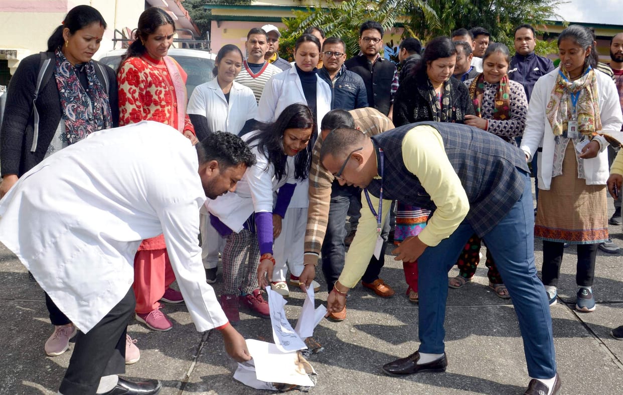 NHM employees burnt copies for not getting incentive money