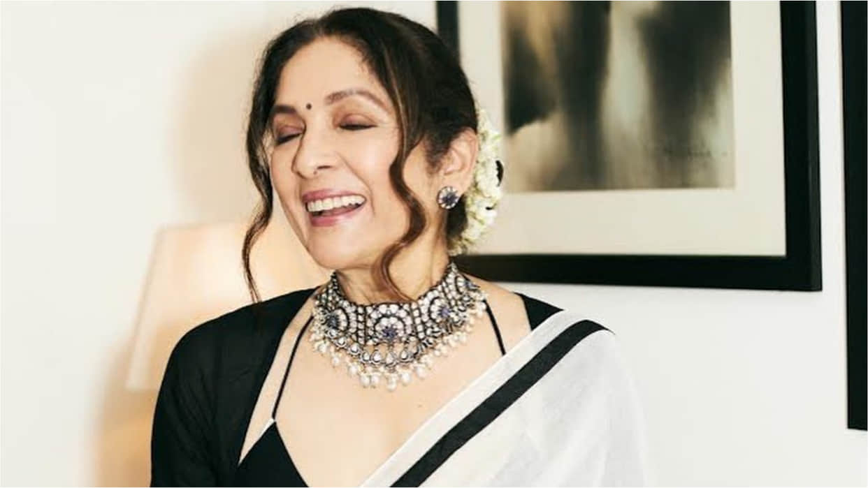 neena gupta in white and black saree with unique design blouse for uunchai promotion
