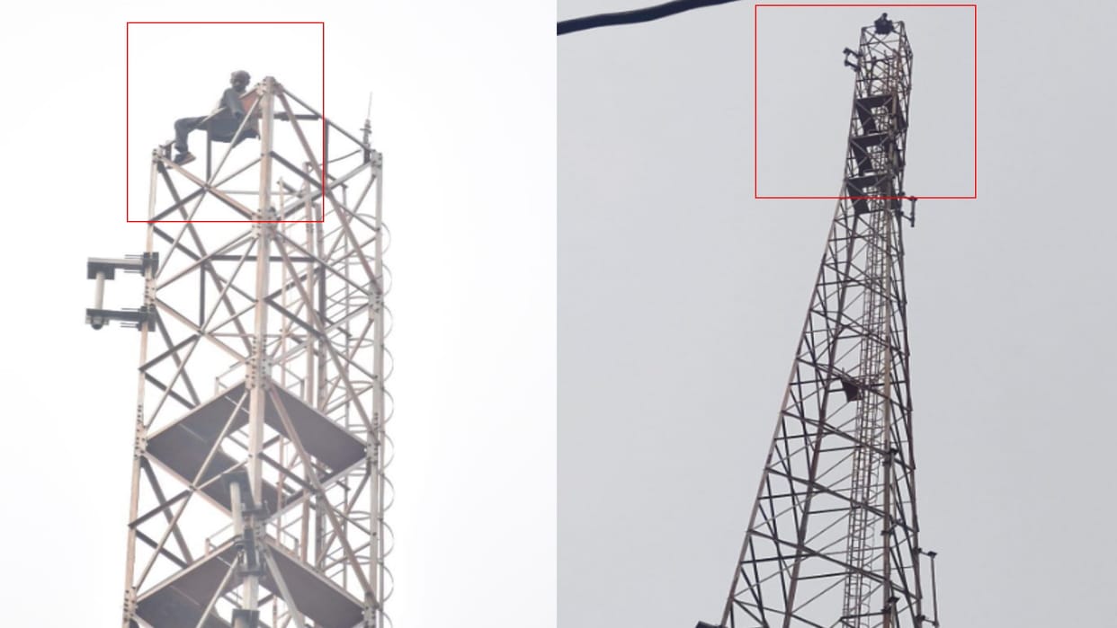 man climb at two hundred feet high mobile tower Bijnor for money for liquer