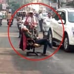 बीच सड़क पर कुर्सी डालकर बैठा रहा दुकानदार।