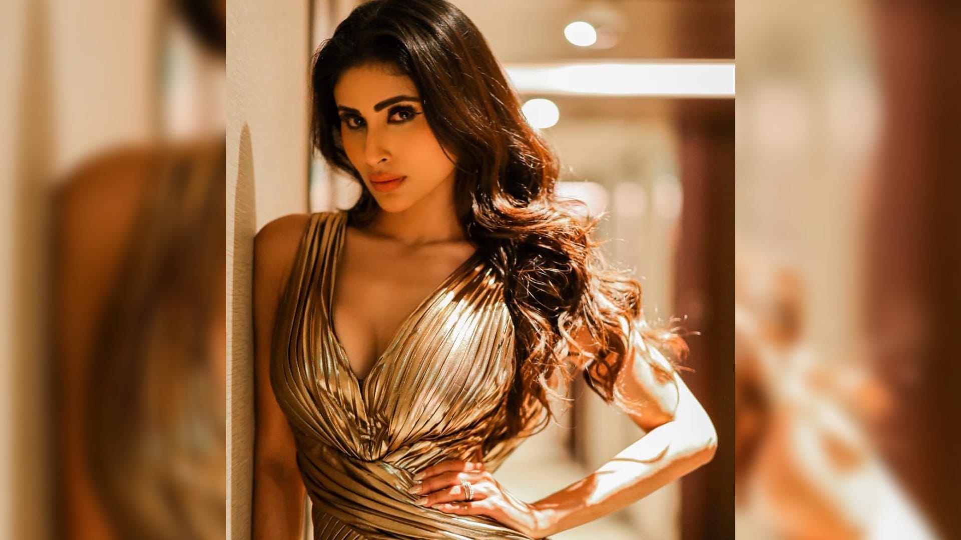 mouni roy adjust her extremely tight dress in front of camera wearing pink floral dress