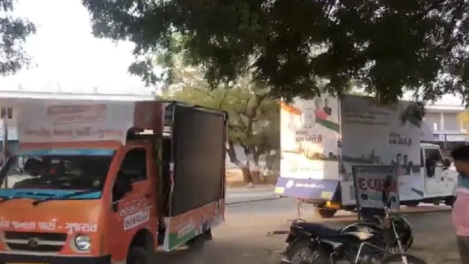 Congress Vehicle Towed BJPs Vehicle in Gujarat Election 2022 Video Viral