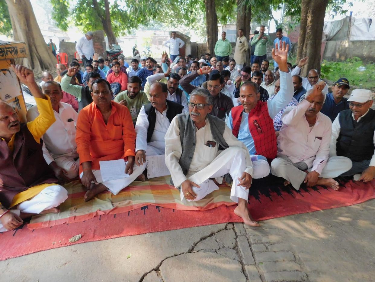 tubewell workers staged a sit-in