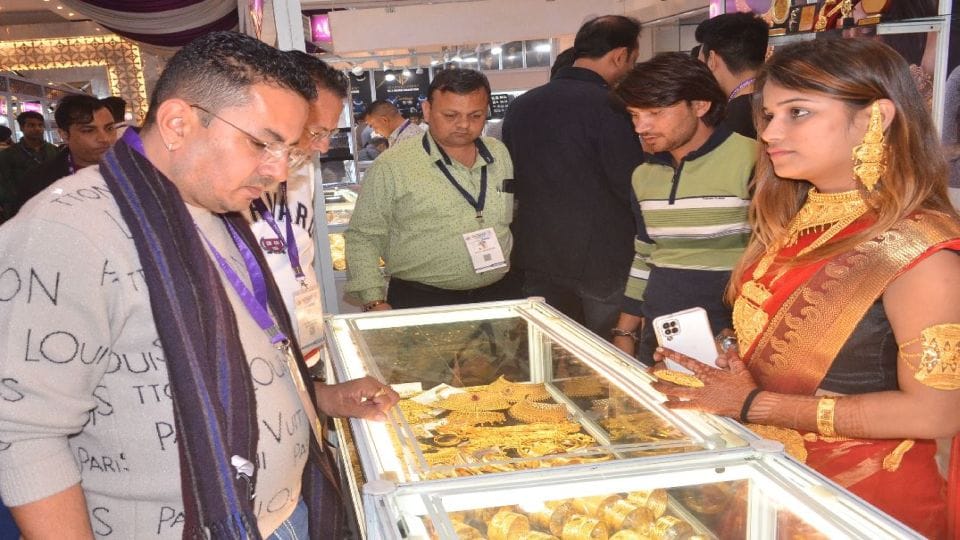 Silver shoe and car and gold jewellery in Jewellery Expo in Agra