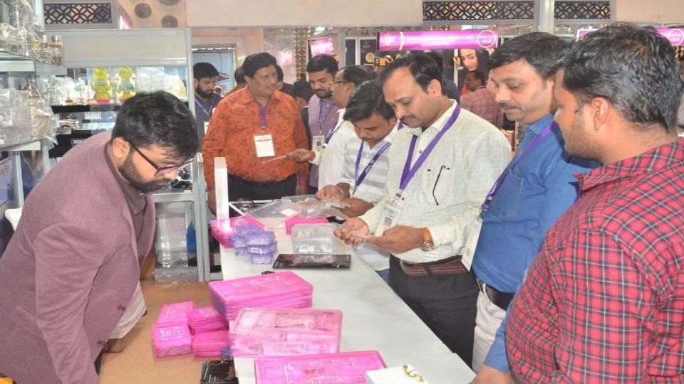 Silver shoe and car and gold jewellery in Jewellery Expo in Agra