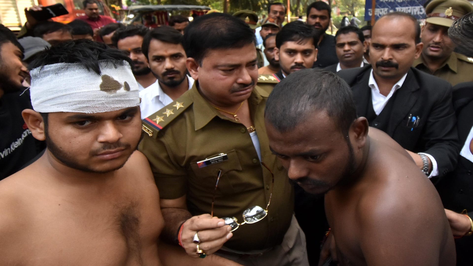 Angry students sit on dharna at police station demanding arrest of accused