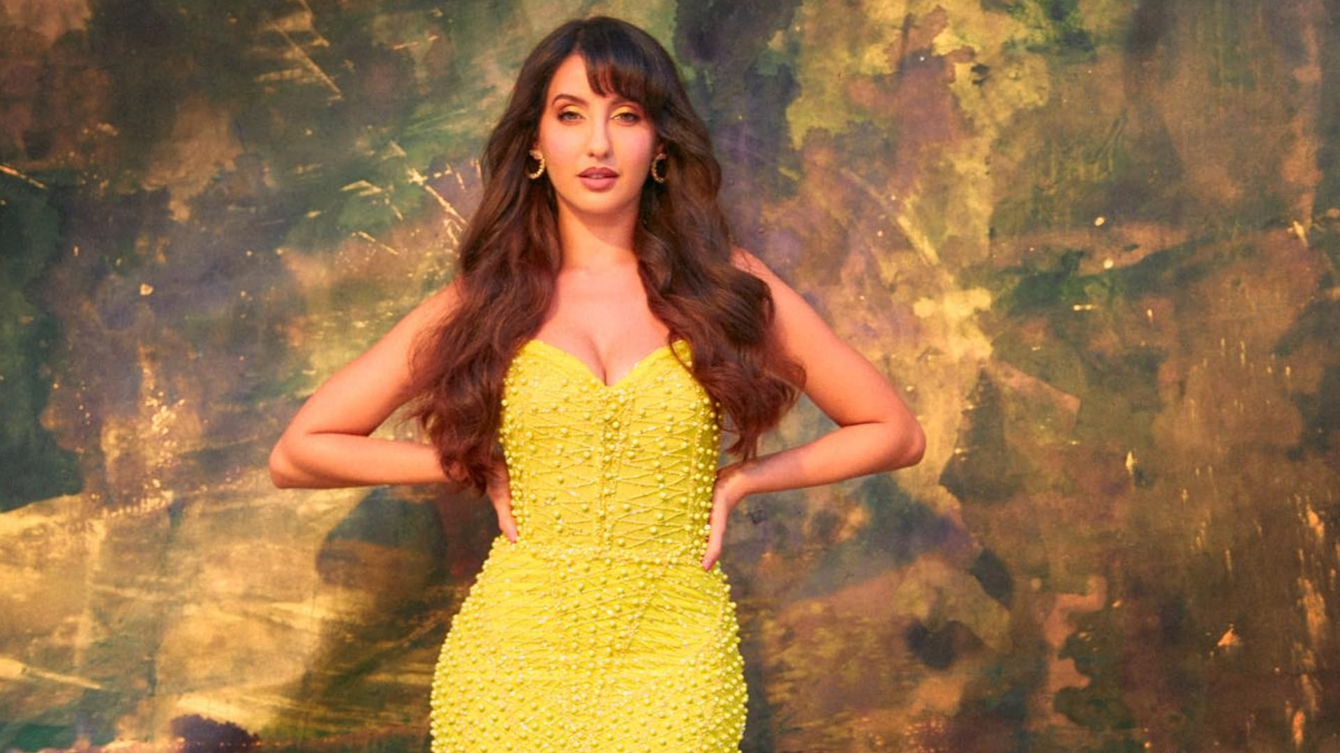 nora fatehi flaunts curve in yellow gown price shock anyone