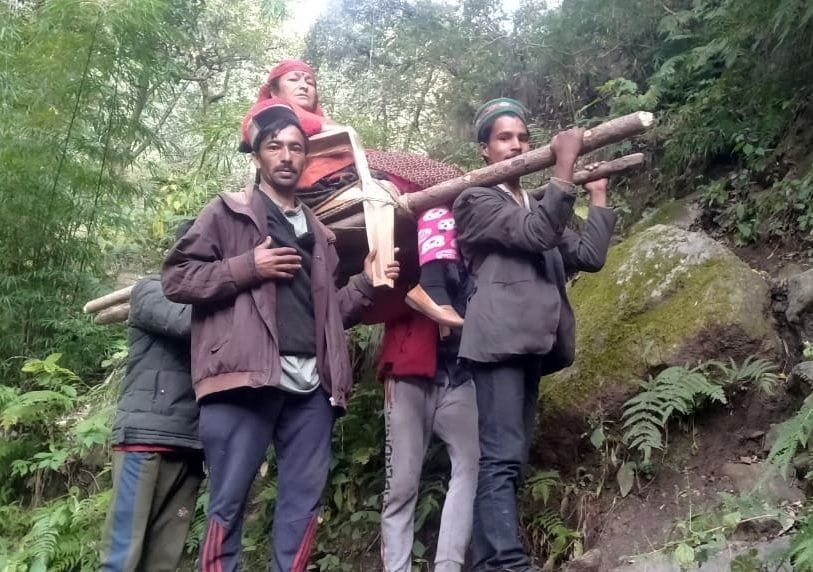 The woman was carried on a chair and taken to Mail village, nine kilometers away