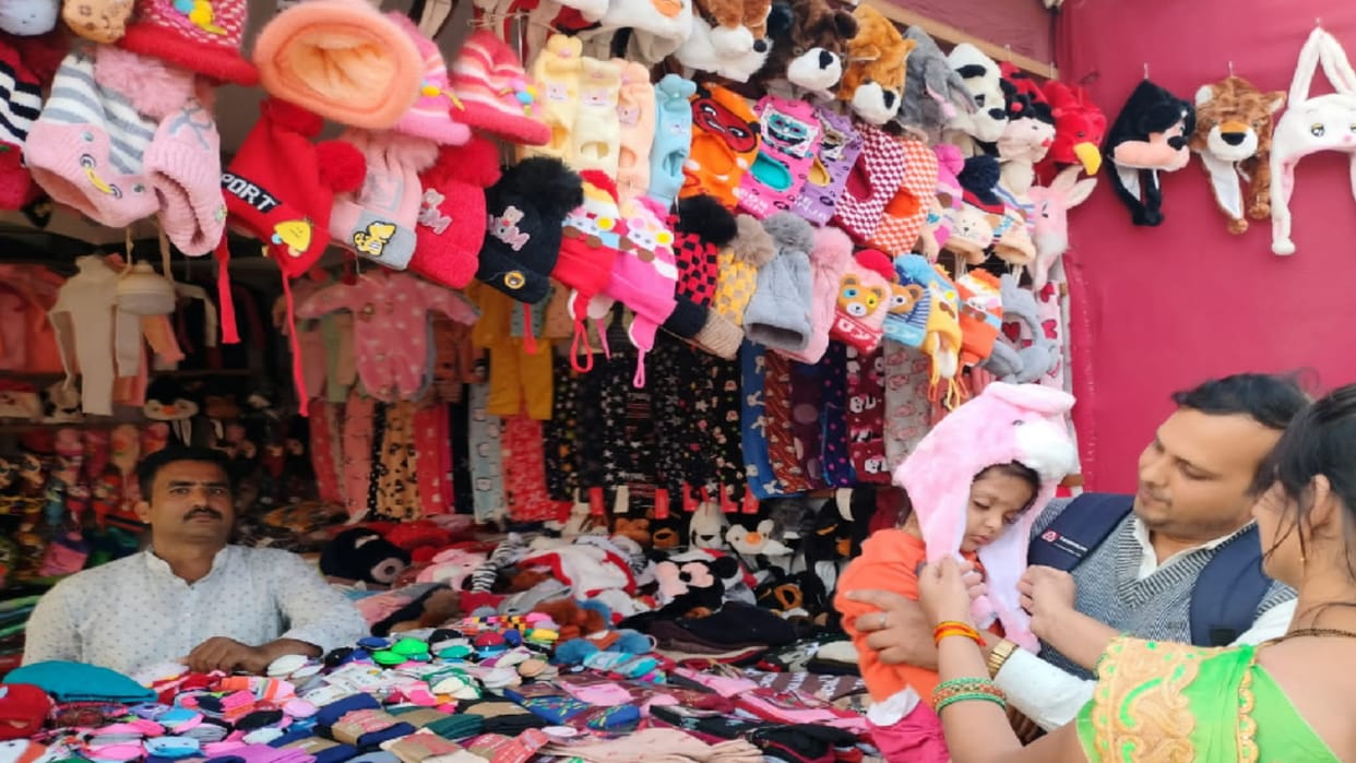 Cold catching pace market decorated with woolen clothes