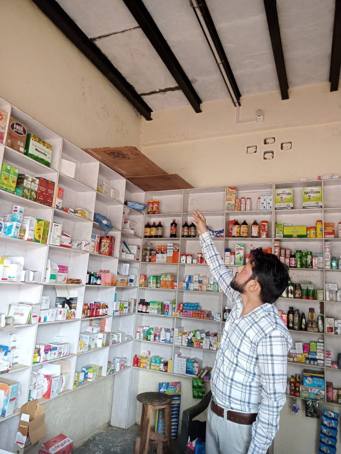 Theft by uprooting the shutter of two shops including medical store