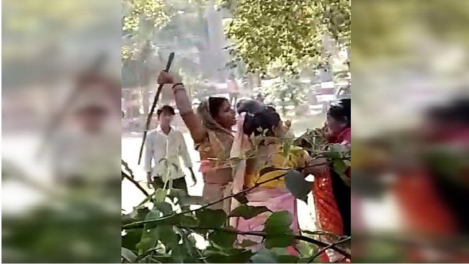 Mother and wife beat up a woman sitting with her husband in Lalitpur
