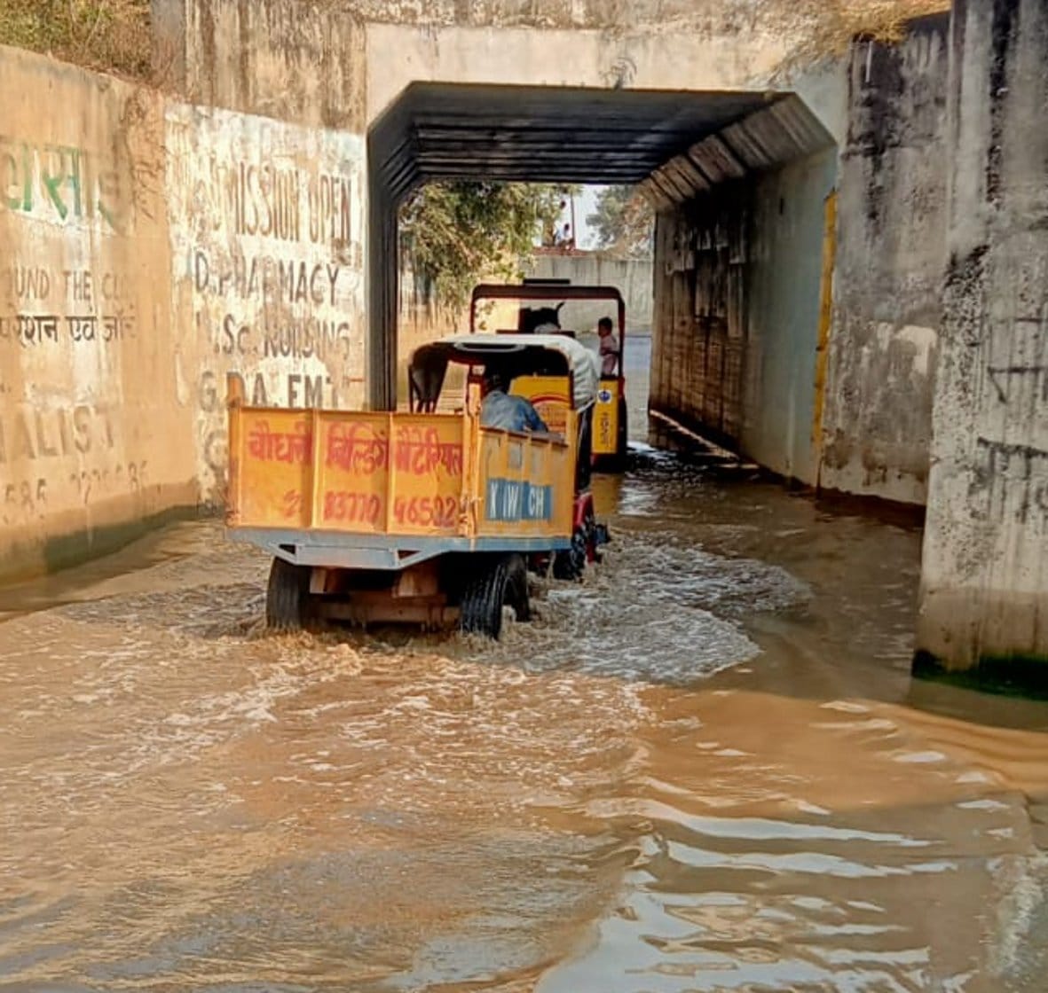 Drain water filled in underpass, villagers upset