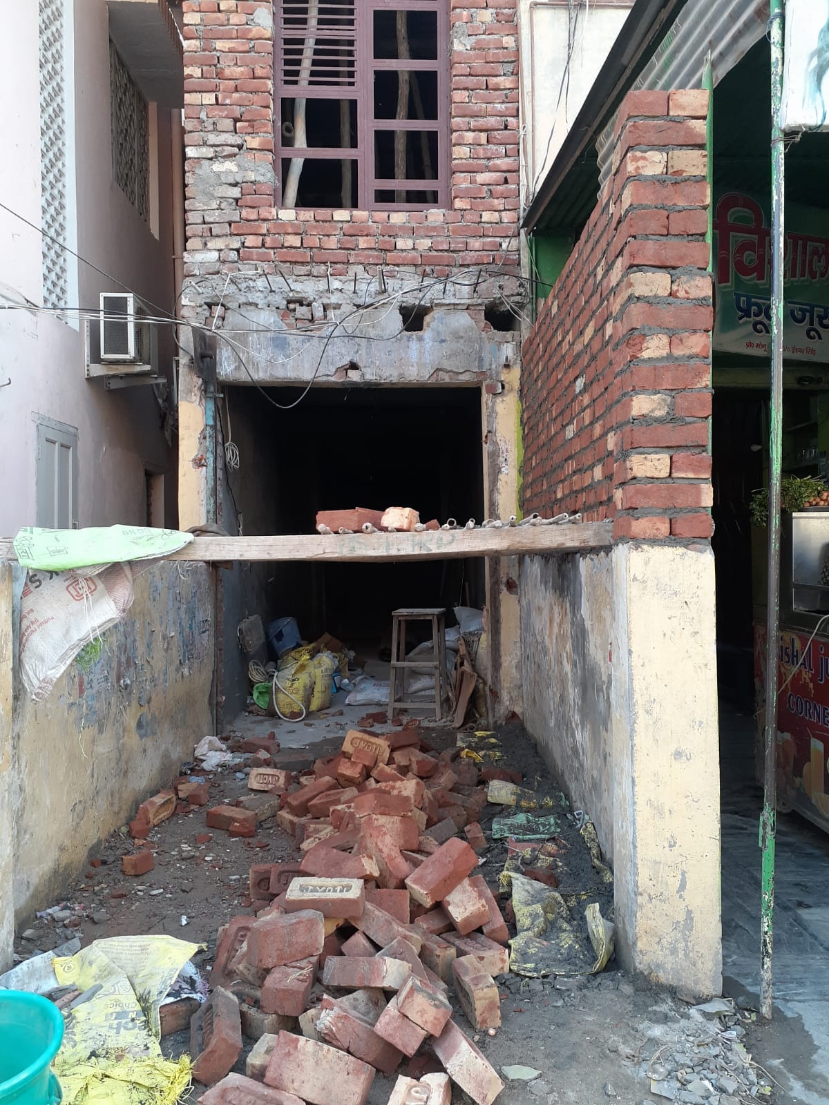 Started construction by occupying government land