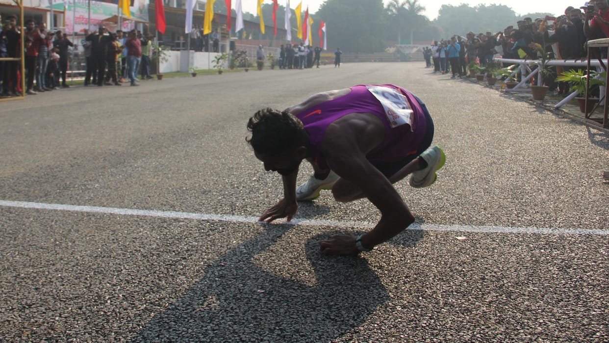 Vikram Bangaria the runner-up fell down after reaching the finish line