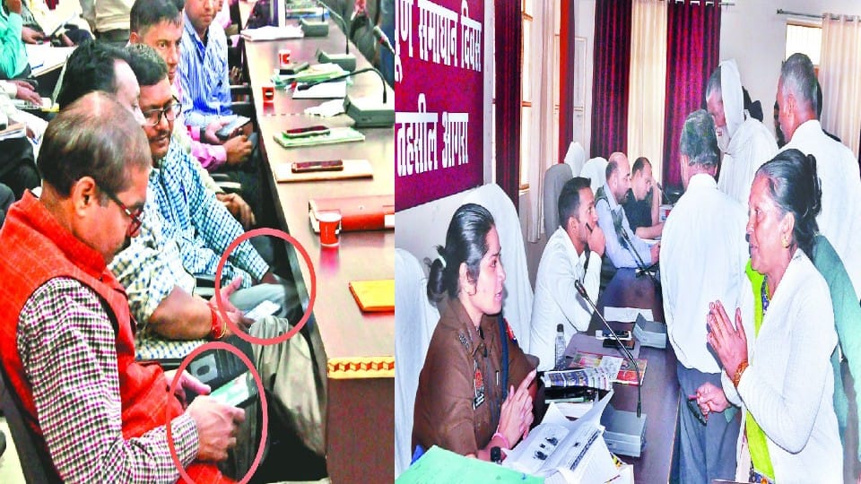 Officers busy on mobile during Sampurna Samadhan Divas in Agra