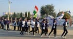नौसेना की मैराथन दौड़ में भाग लेते प्रतिभागी।