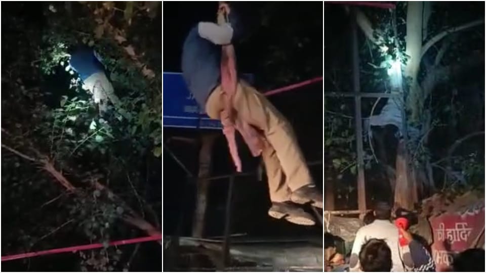 police brought down the young man by crane who climbed the tree at night in agra