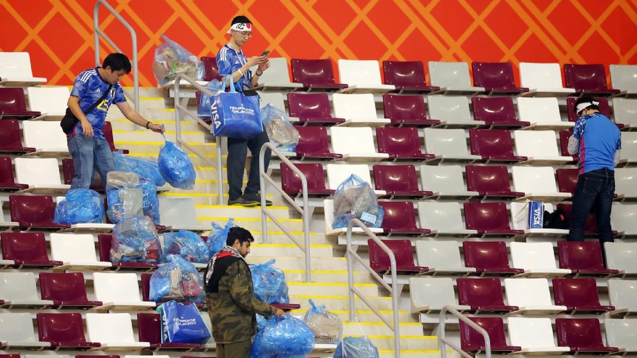 Japanese football team fans clean stadium after their team beat germany by 2-1 in FIFA WC Match watch video