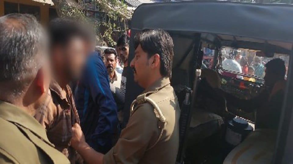 young man sitting with a girl in a black glass car clashed with up police daroga in mainpuri