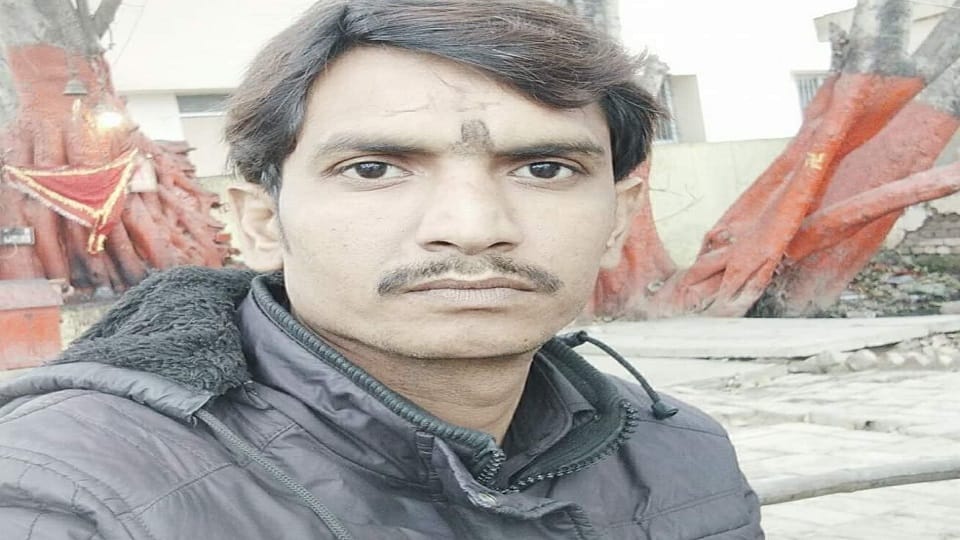 young man died after being hit by a train while taking a selfie in Badaun