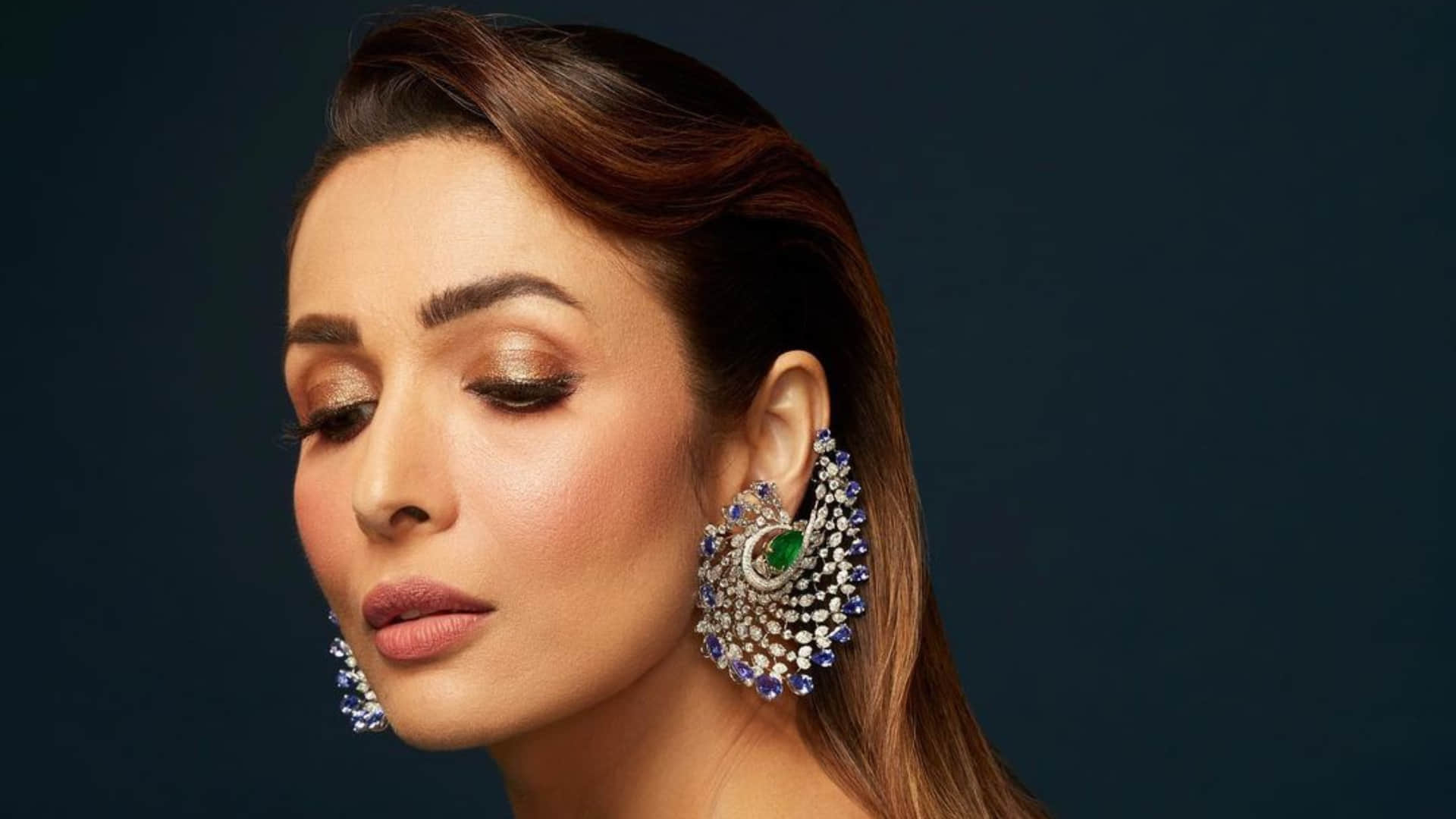 malaika arora stuns in black leather pant and matching bustier with fur coat