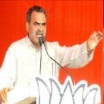 मंत्री संजीव बालियान और सीएम योगी आदित्यनाथ।