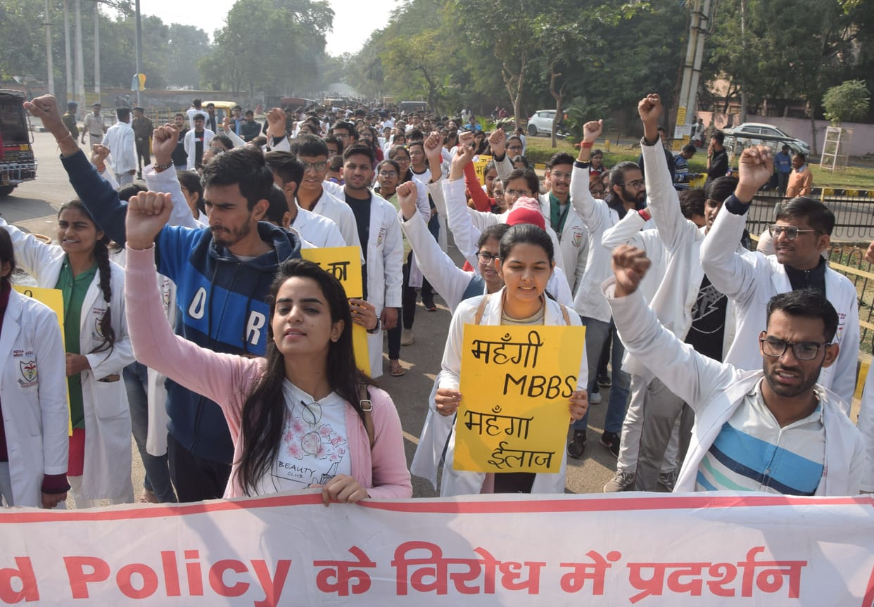 MBBA students take out fury march against bond policy