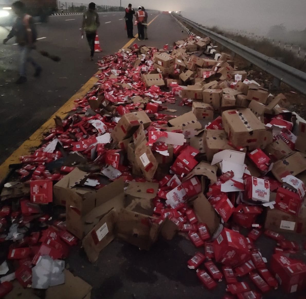 Trucks collide due to fog, liquor bottles scattered