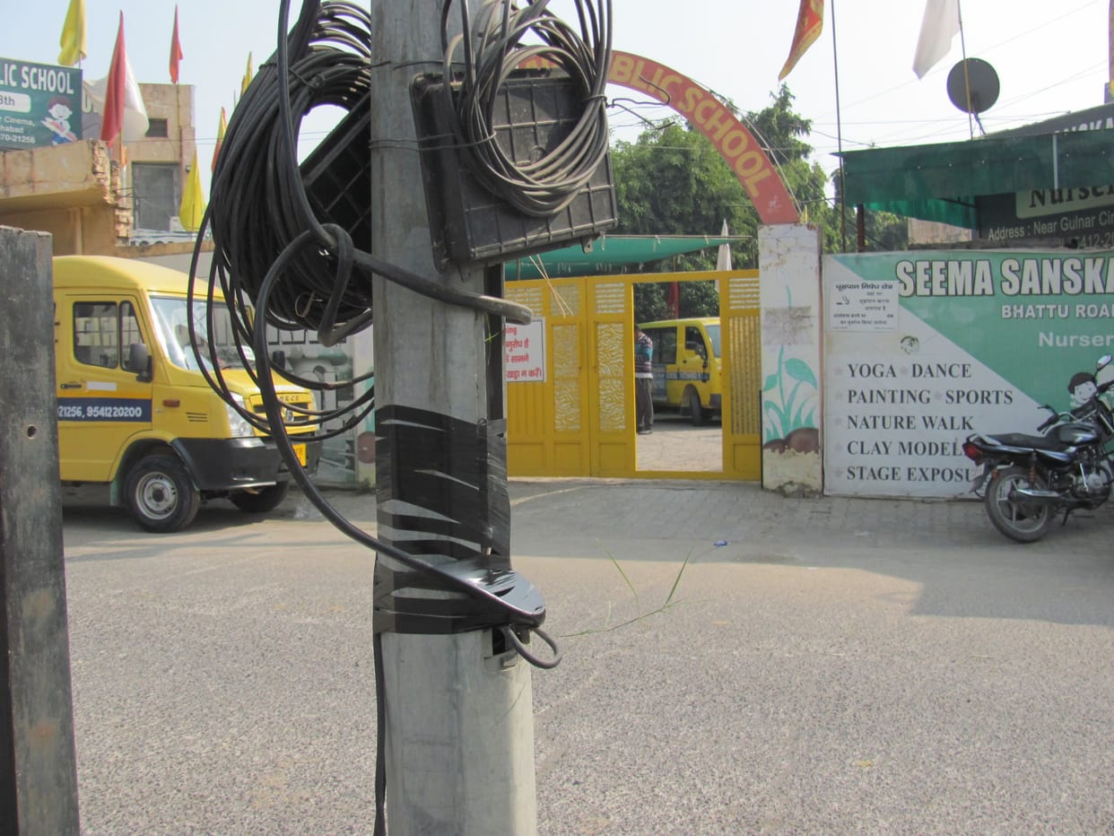 City council puts tape on lids of street light poles