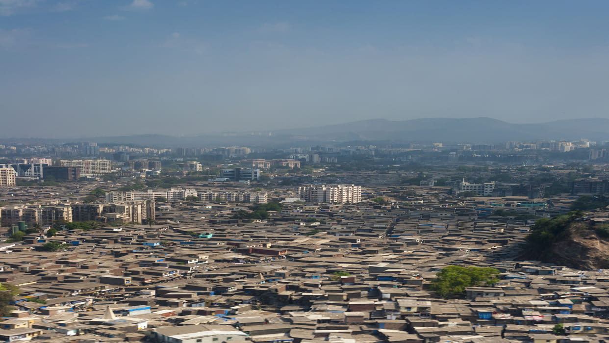 gautam adani group dharavi redevelopment history of dharavi in hindi dharavi economy mumbai