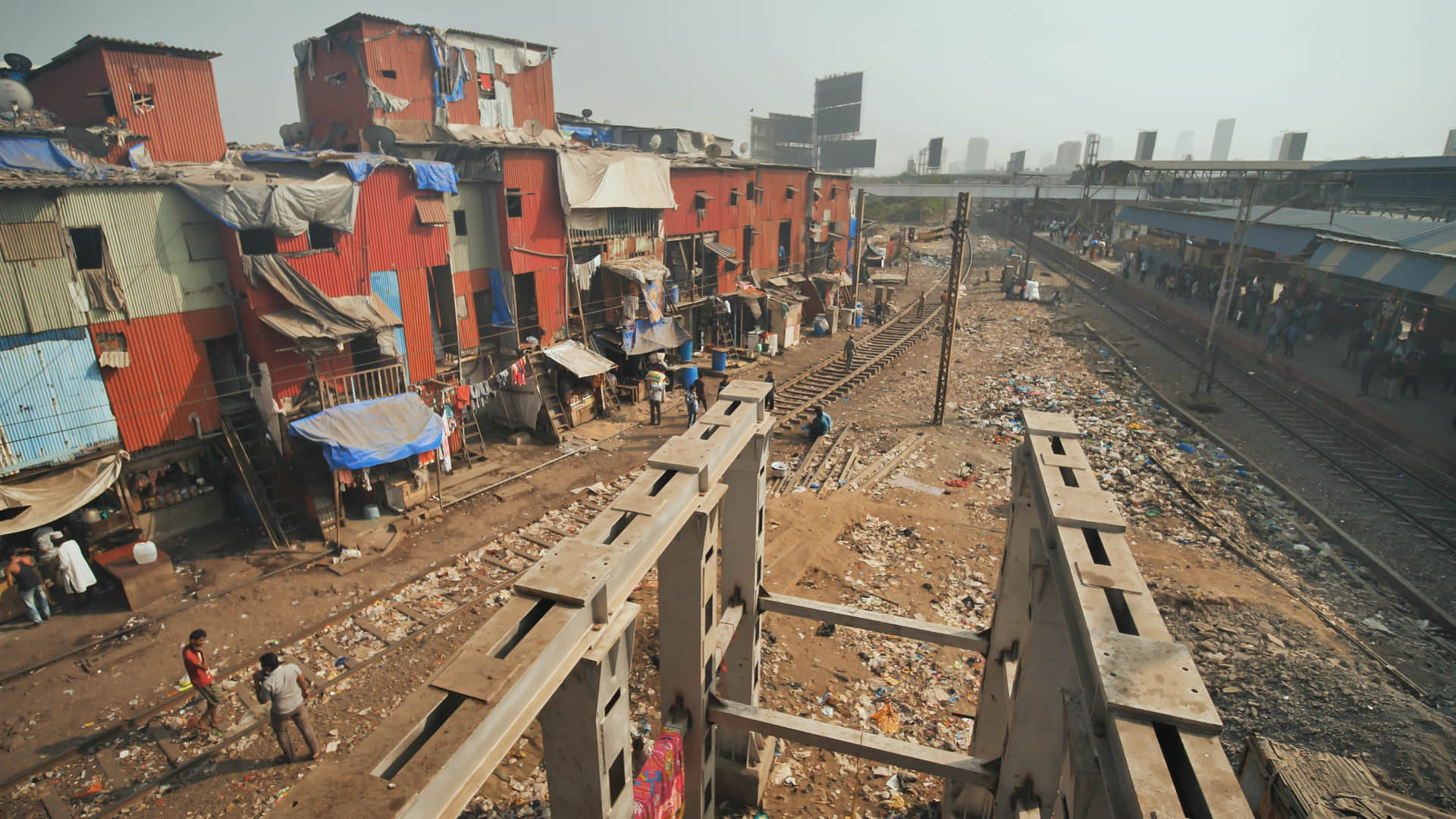 gautam adani group dharavi redevelopment history of dharavi in hindi dharavi economy mumbai