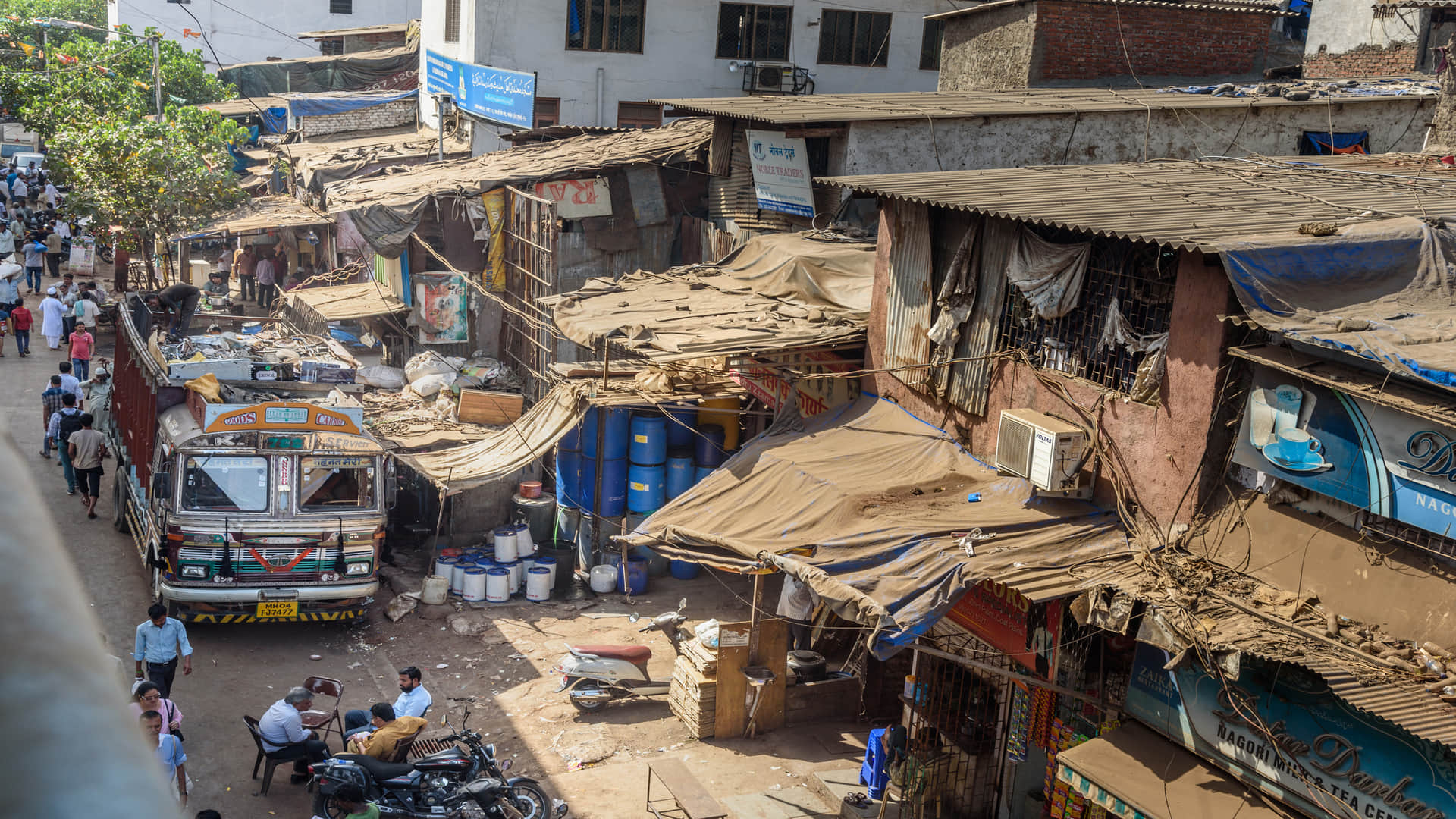 gautam adani group dharavi redevelopment history of dharavi in hindi dharavi economy mumbai