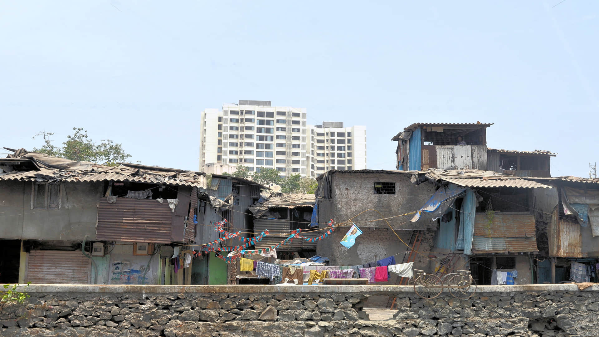gautam adani group dharavi redevelopment history of dharavi in hindi dharavi economy mumbai