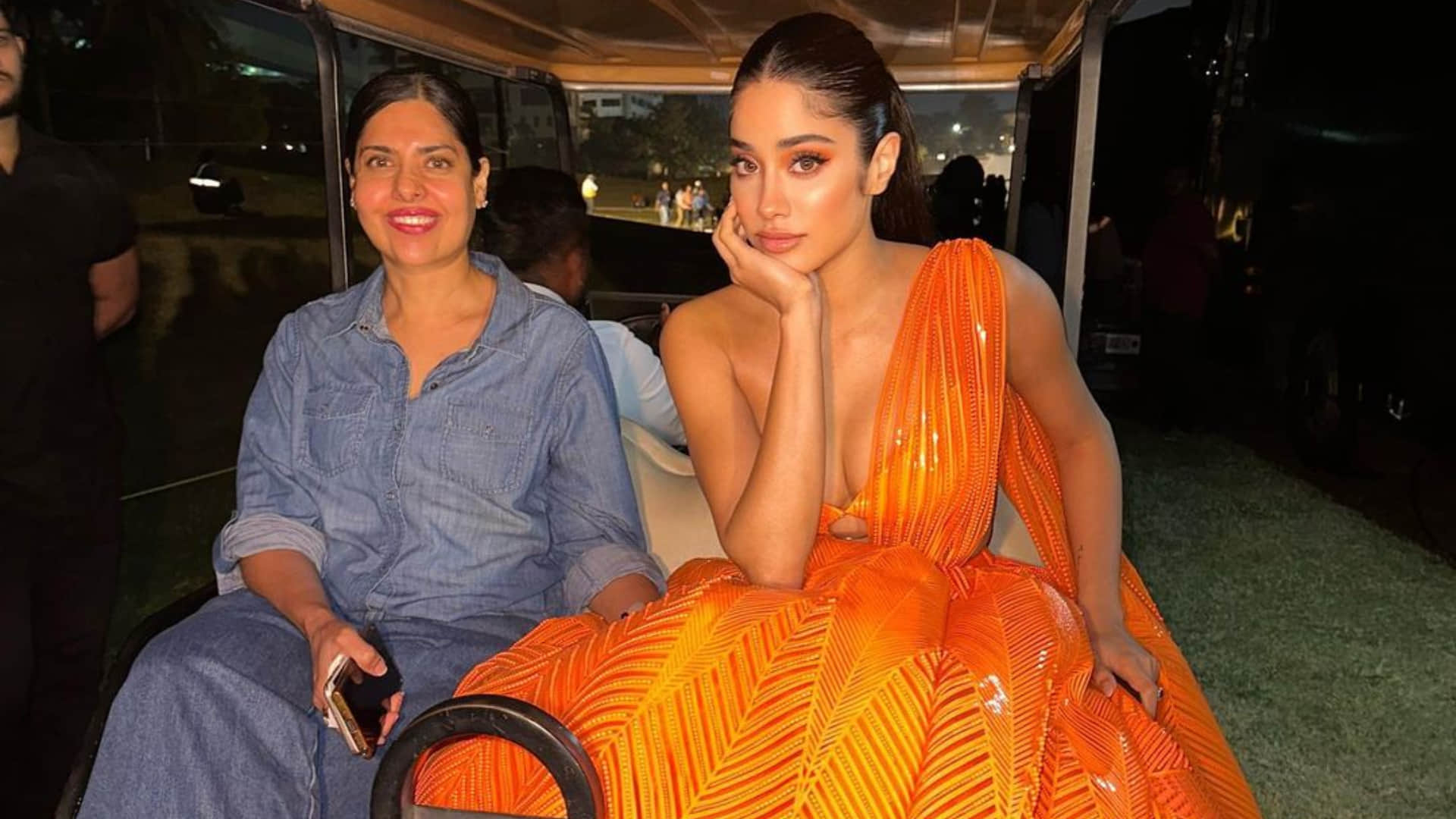 janhvi kapoor on ramp in orange lehenga with hot blouse design