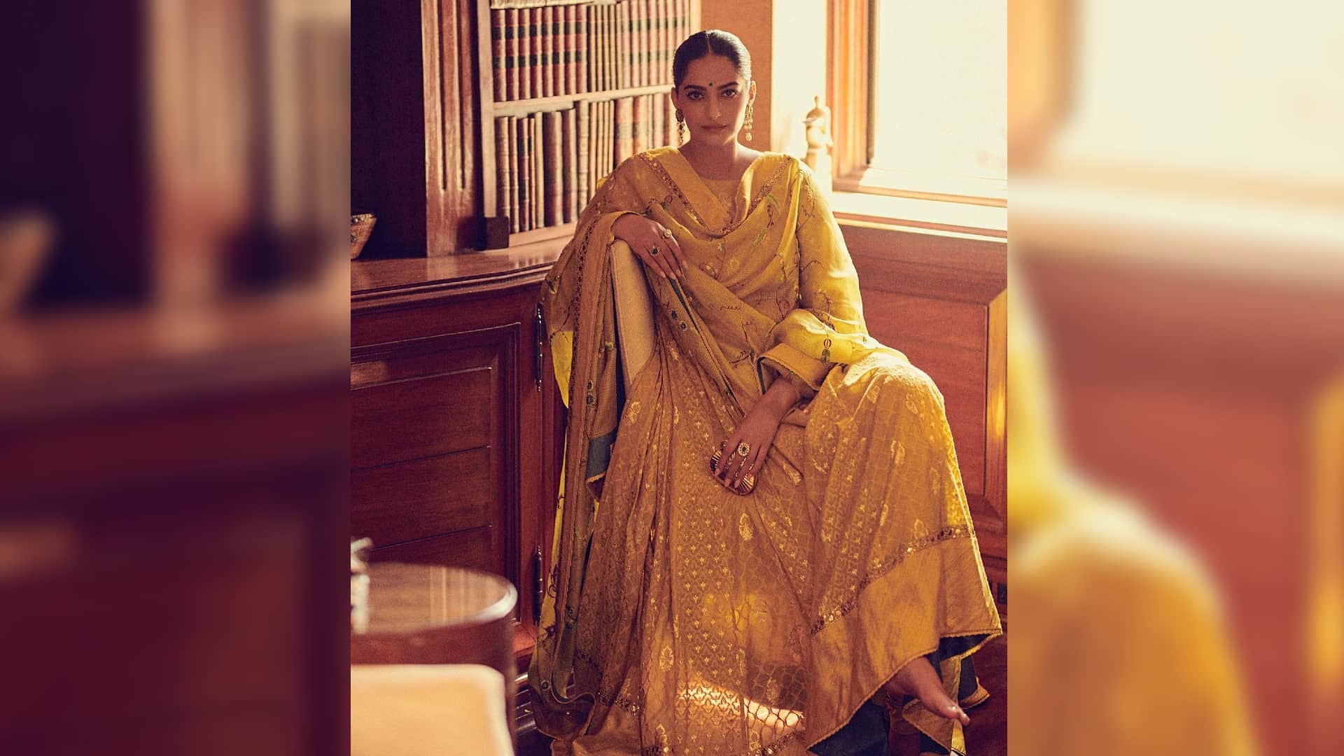 sonam kapoor yellow anarkali suit with green bindi and gajra look simply wow