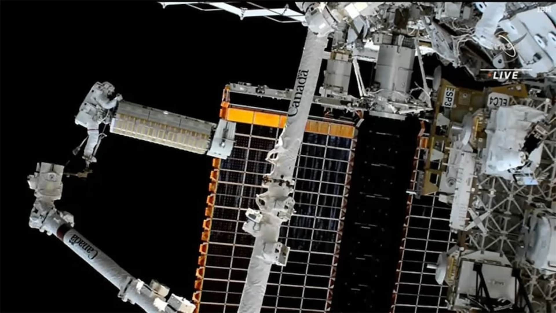 Spacewalking astronauts install solar array outside International Space Station Nasa Shares Video
