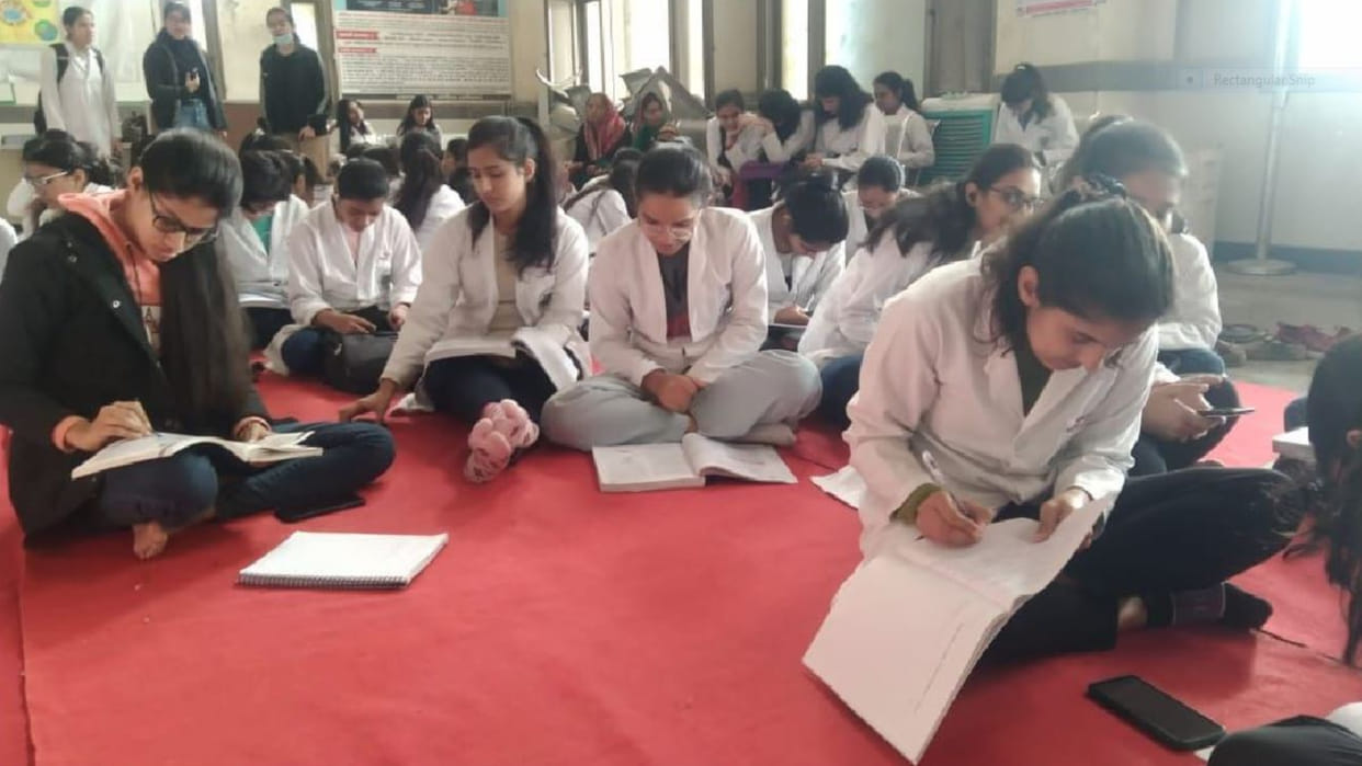 240 girl students of the medical college boycotted the examination in protest against the bond policy