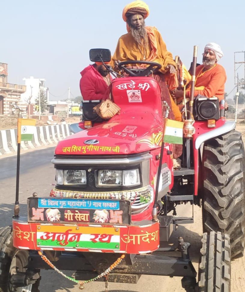 Rajendra Nath came out of Barot while standing and driving a tractor