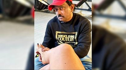 Dangerous Director Ram Gopal Varma kissed actress foot and give massage for film promotion photos goes viral