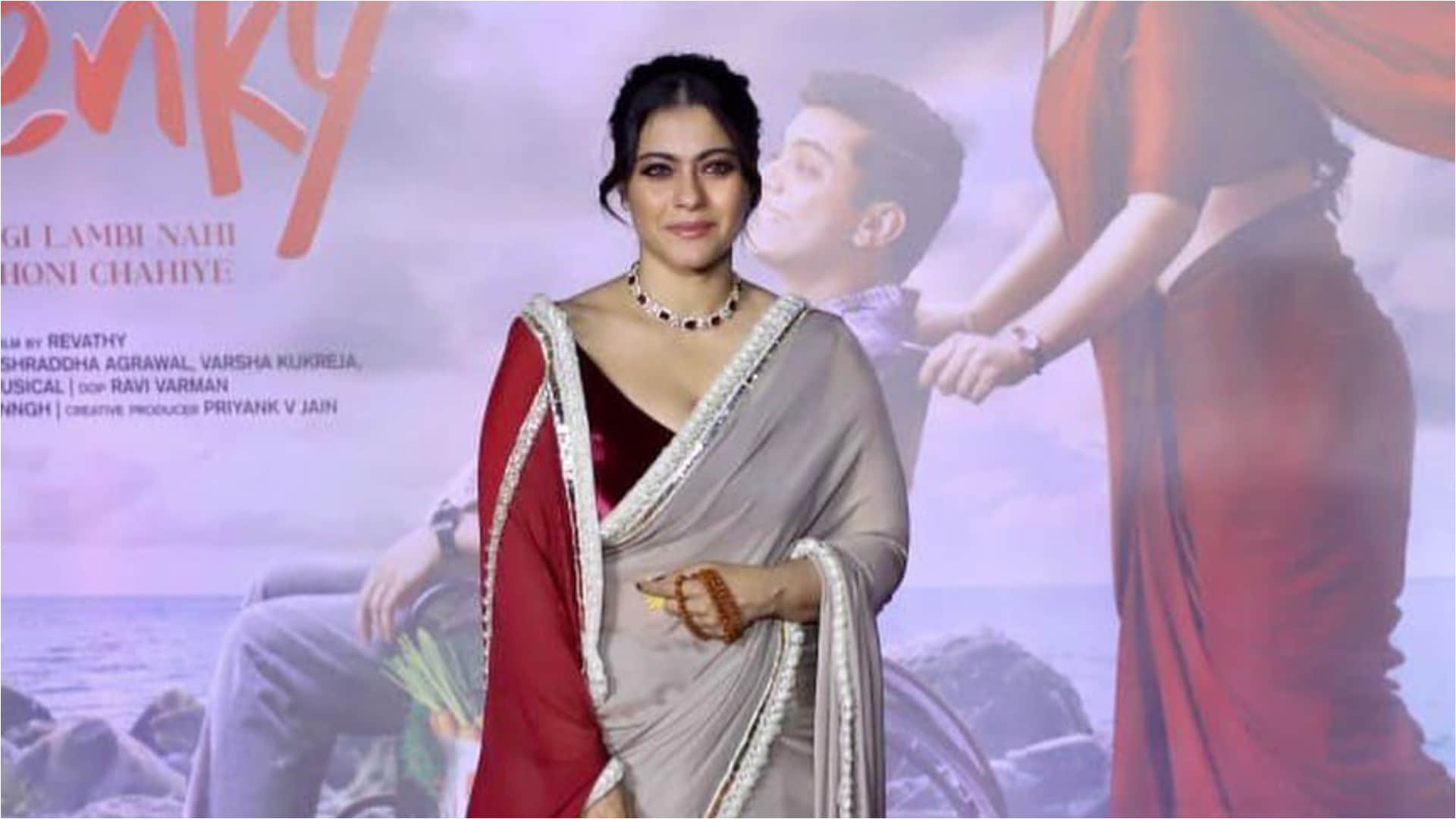 kajol seems uncomfortable while walk wear saree in movie premiere salaam venky`
