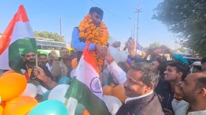 Police officer's unique farewell, sitting on bullock cart and playing drums