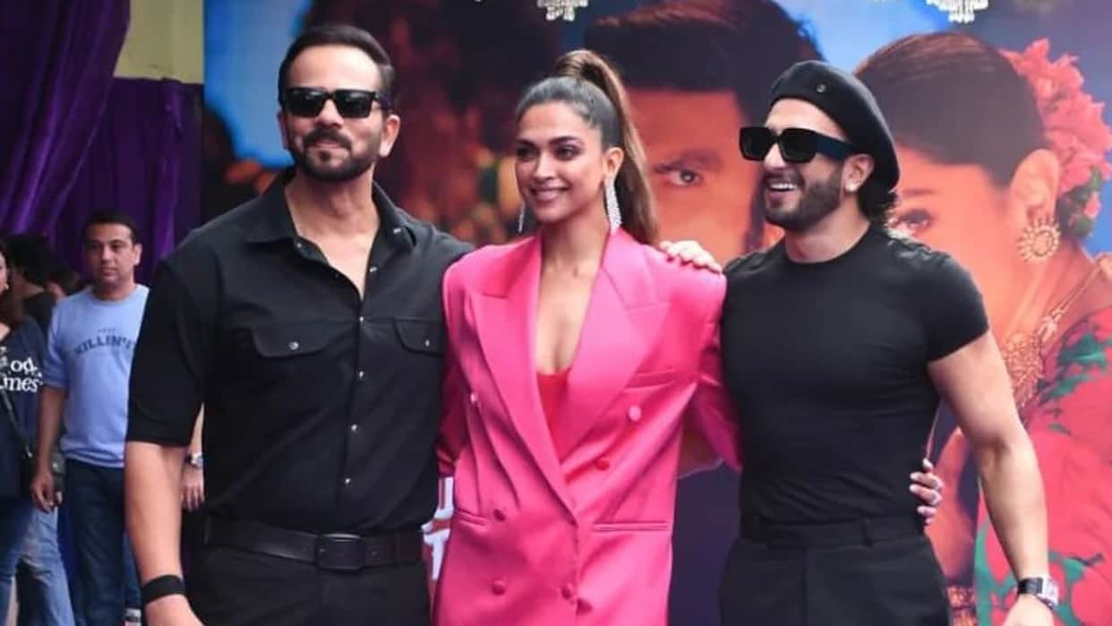 deepika padukone boss lady in pink pant suit high ponytail add drama